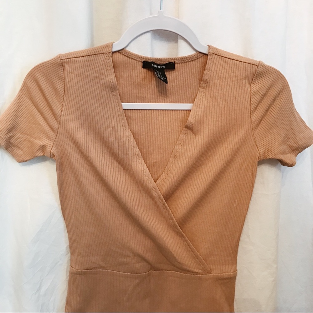 Brand new bodysuit in nude ribbed knit